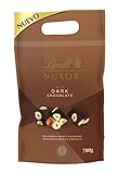 Lindt Nuxor Bolsa de Bombones chocolate negro con avellanas, avellanas tostadas enteras, individualmente envueltos, bombones para regalar, formato de 700g